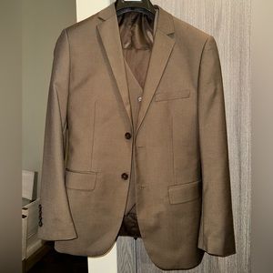Three piece brown suit.